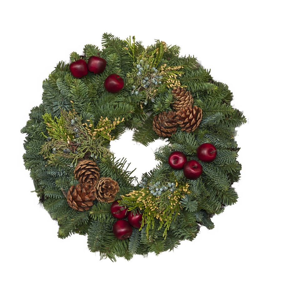 Fresh evergreen holiday wreath with pinecones and berries